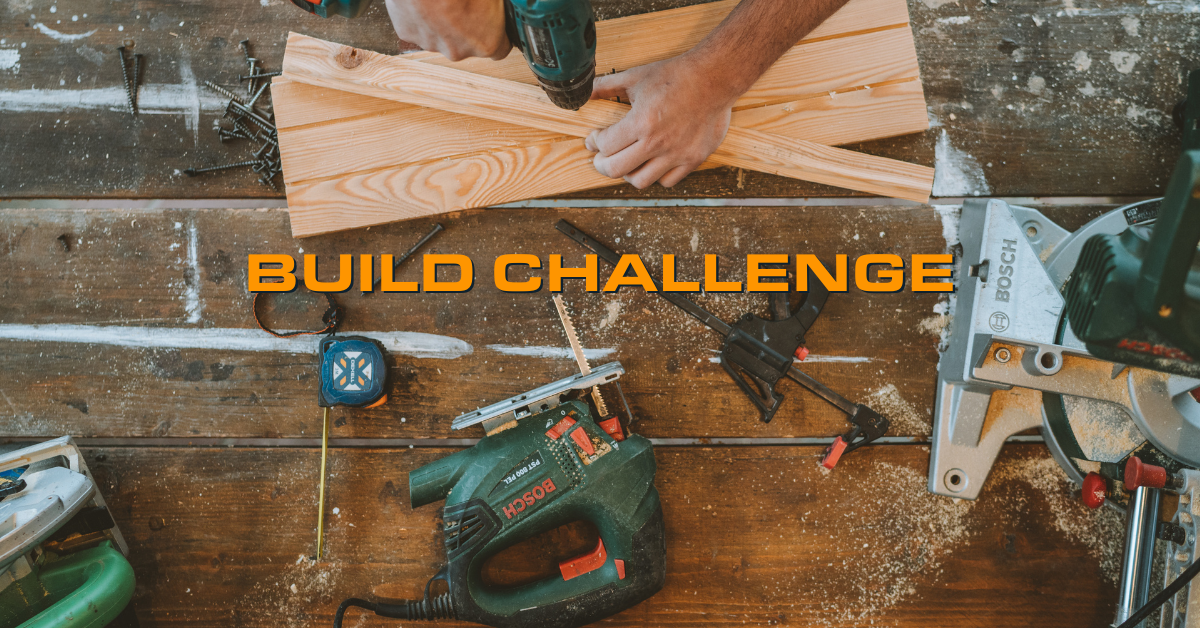 A toolbench with a white man's hands working, with the text "Build Challenge" superimposed over it.